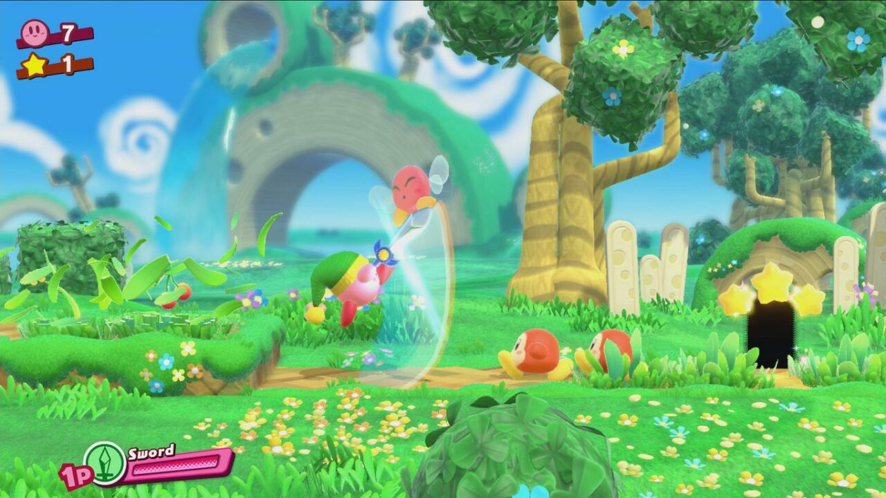 Link-Kirby schwingt mit einem großen Schwertschwung in die Lüfte und greift dabei einen Gegner an.