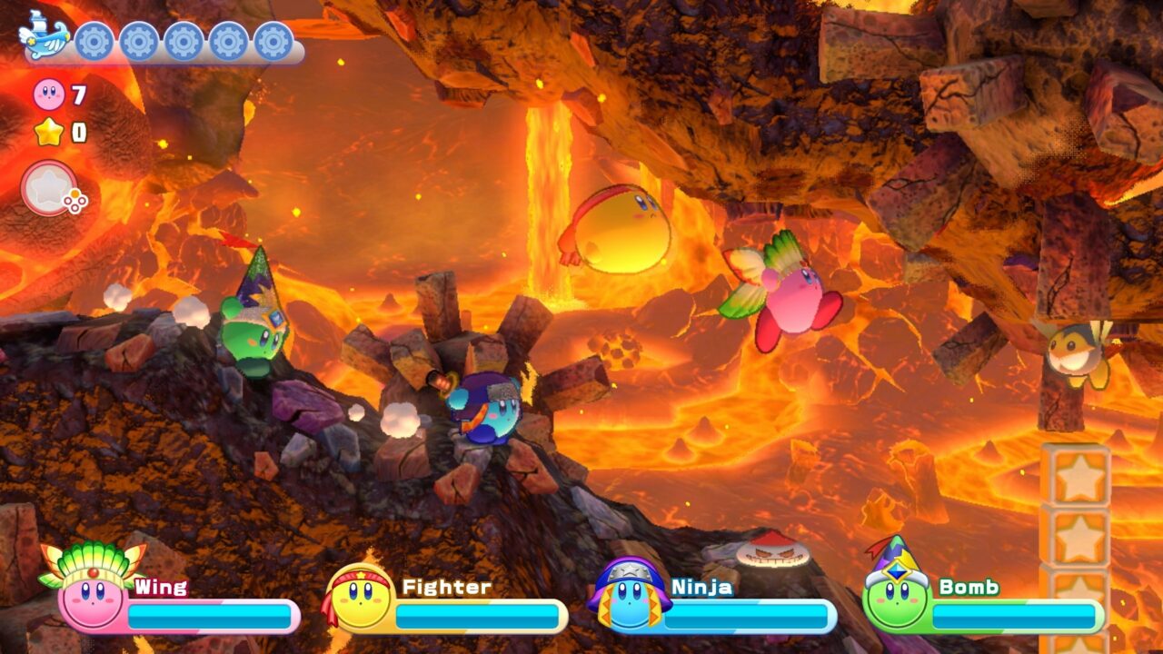 4 Kirbys springen durch ein Lava-Level