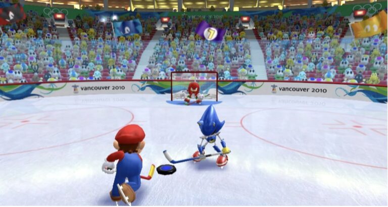 Szene eines Eishockey Spiels: Mario nimmt Anlauf, um mit dem Puck an Metall-Sonic vorbeizuziehen.