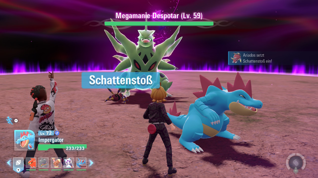 Kampf gegen ein Megamanie-Pokémon, ein gigantisches Monster.